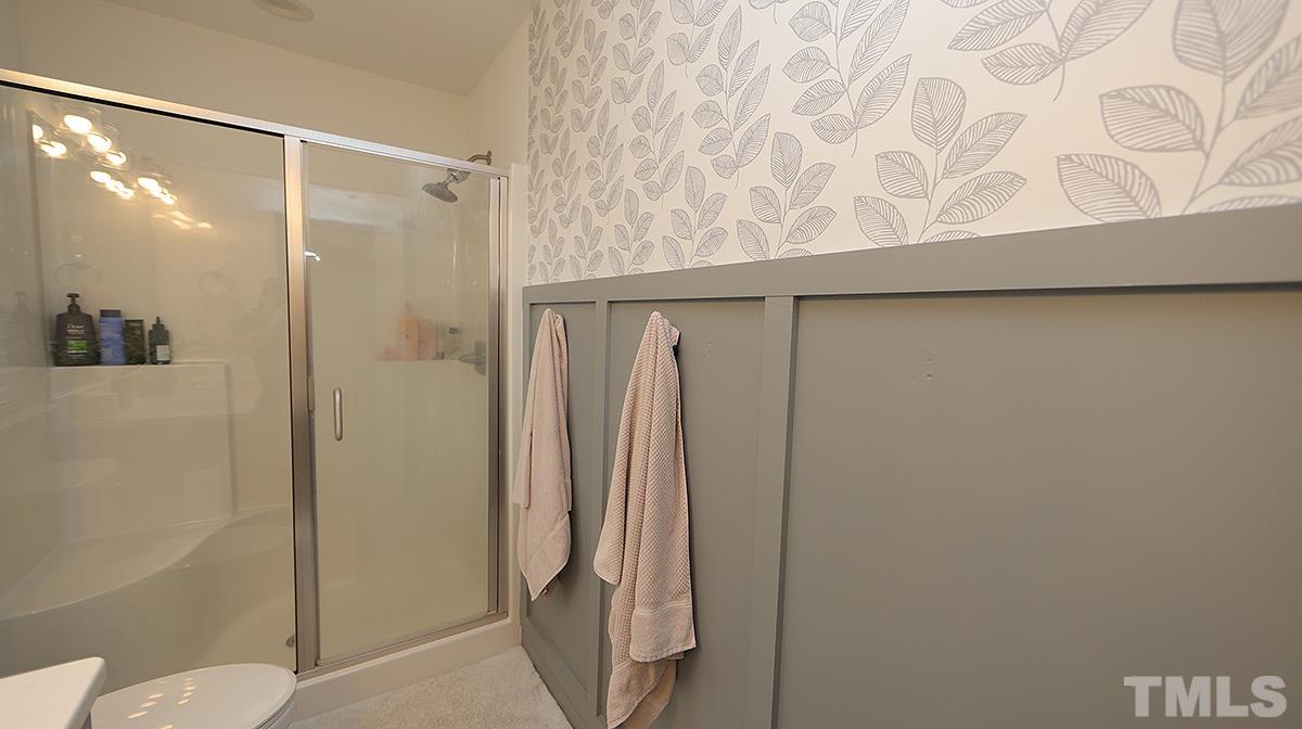 5000 West Pool Road Rougemont, NC 27572 - Photo 23 of 29 a bathroom with a shower and a toilet