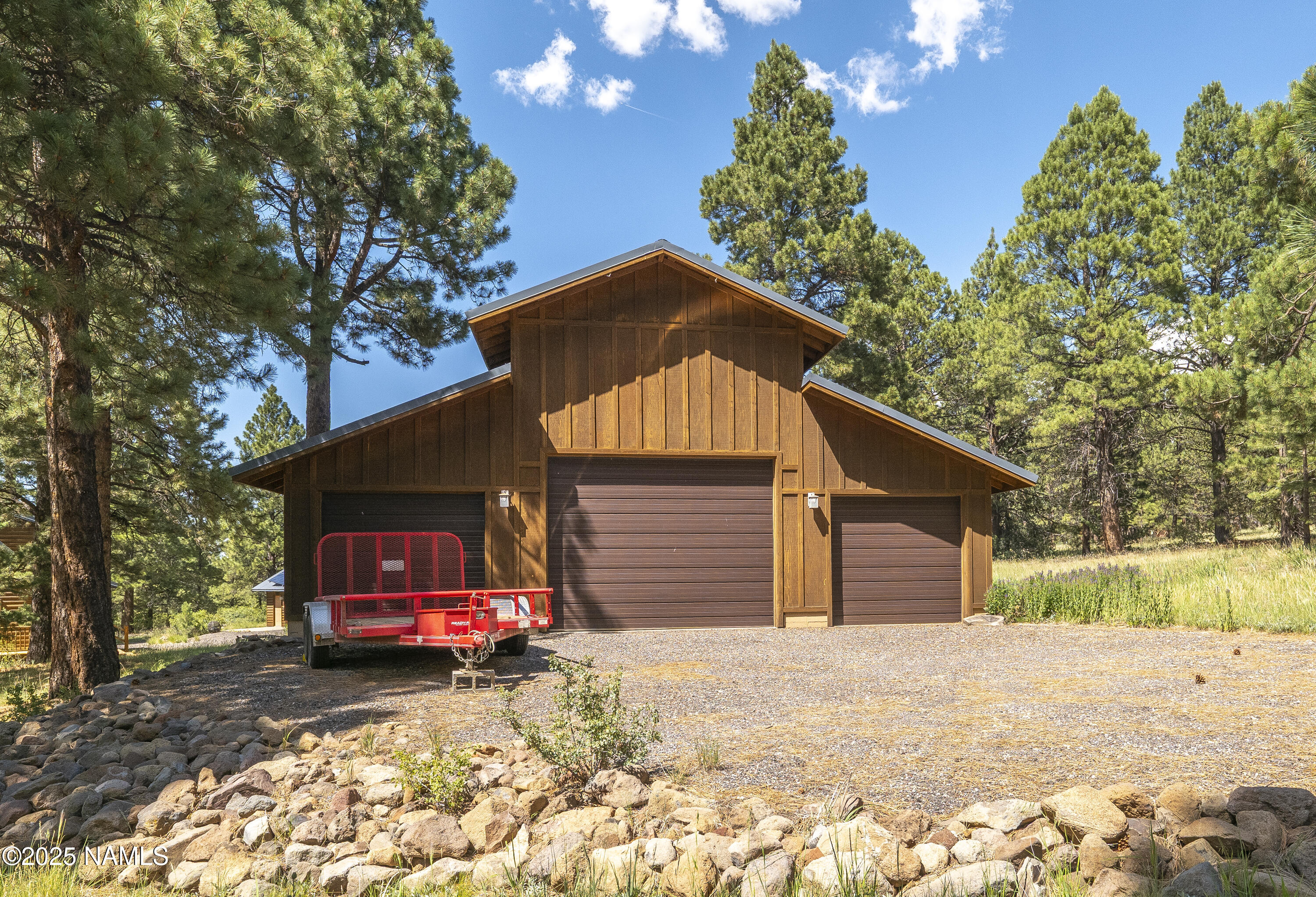 13898 Alpenglow Road Flagstaff, AZ 86001 - Photo 15 of 39 a view of a house with a yard