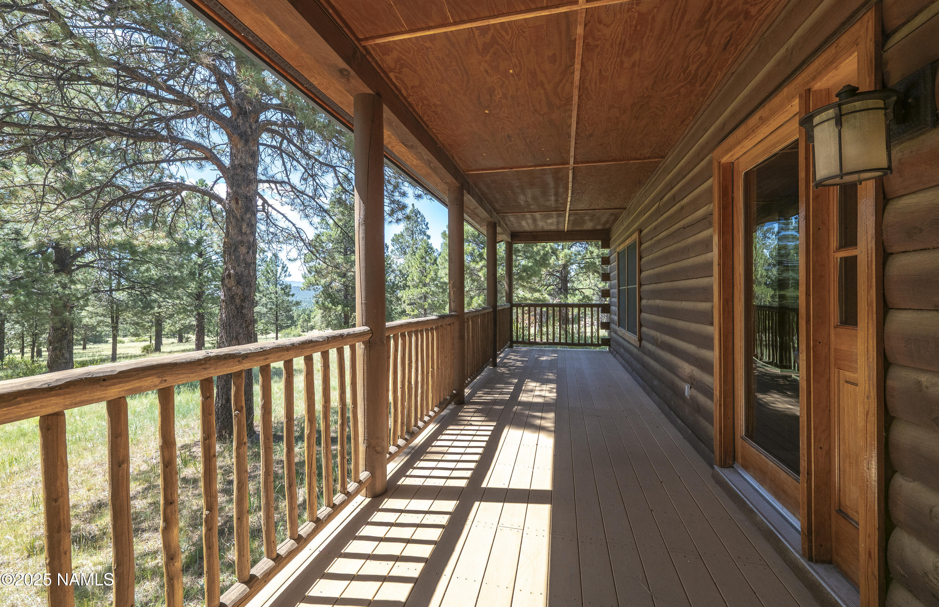 13898 Alpenglow Road Flagstaff, AZ 86001 - Photo 22 of 39 a view of balcony with wooden floor