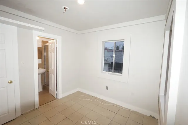 a bathroom with a sink and shower