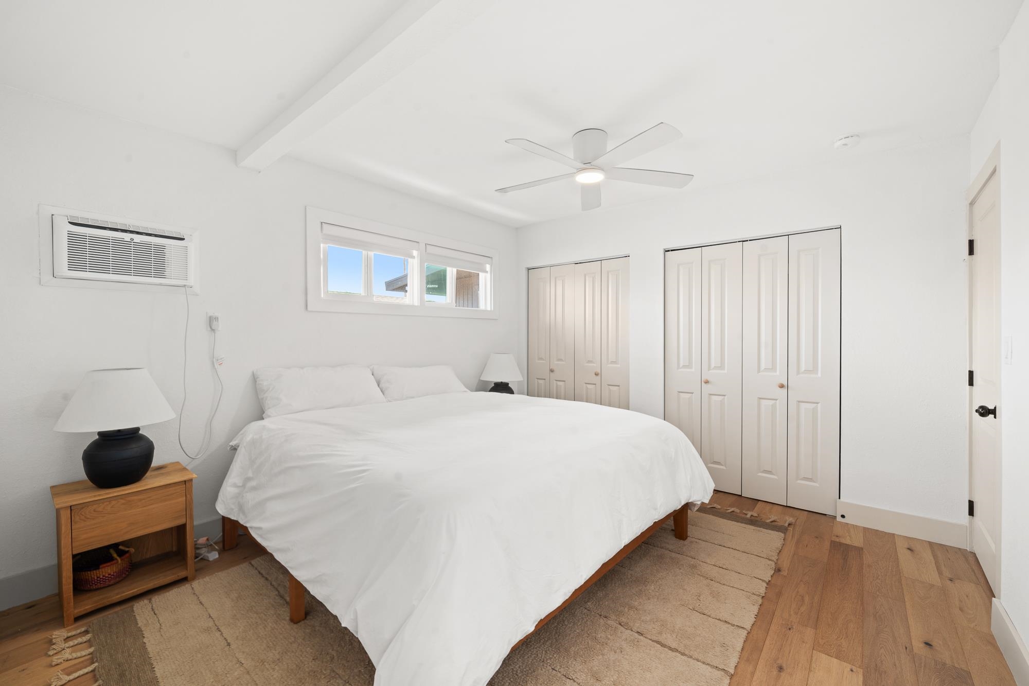 2074 Puuohala Road Wailuku, HI 96793 - Photo 13 of 37 a spacious bedroom with a bed and a chandelier