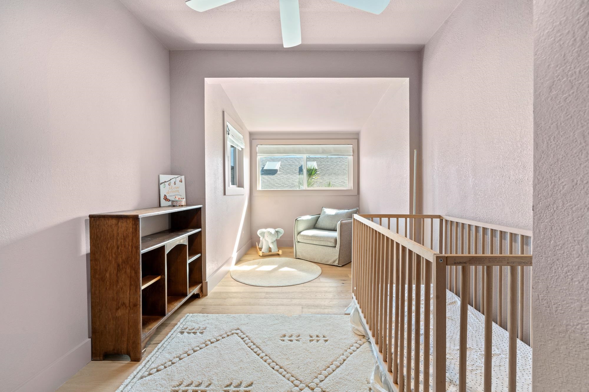 2074 Puuohala Road Wailuku, HI 96793 - Photo 17 of 37 a living room with furniture a rug and white walls