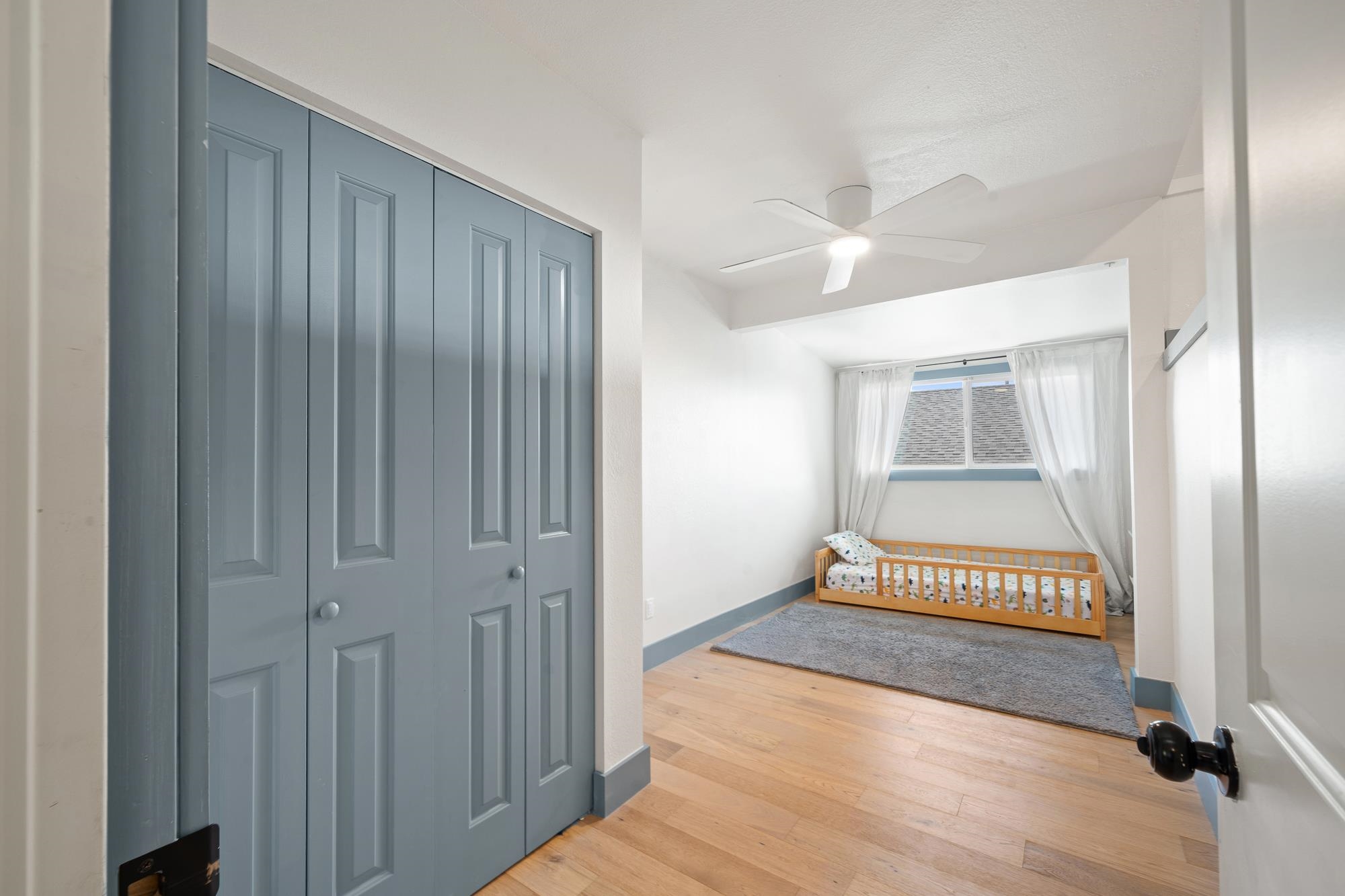 2074 Puuohala Road Wailuku, HI 96793 - Photo 18 of 37 a bedroom with a bed and a window