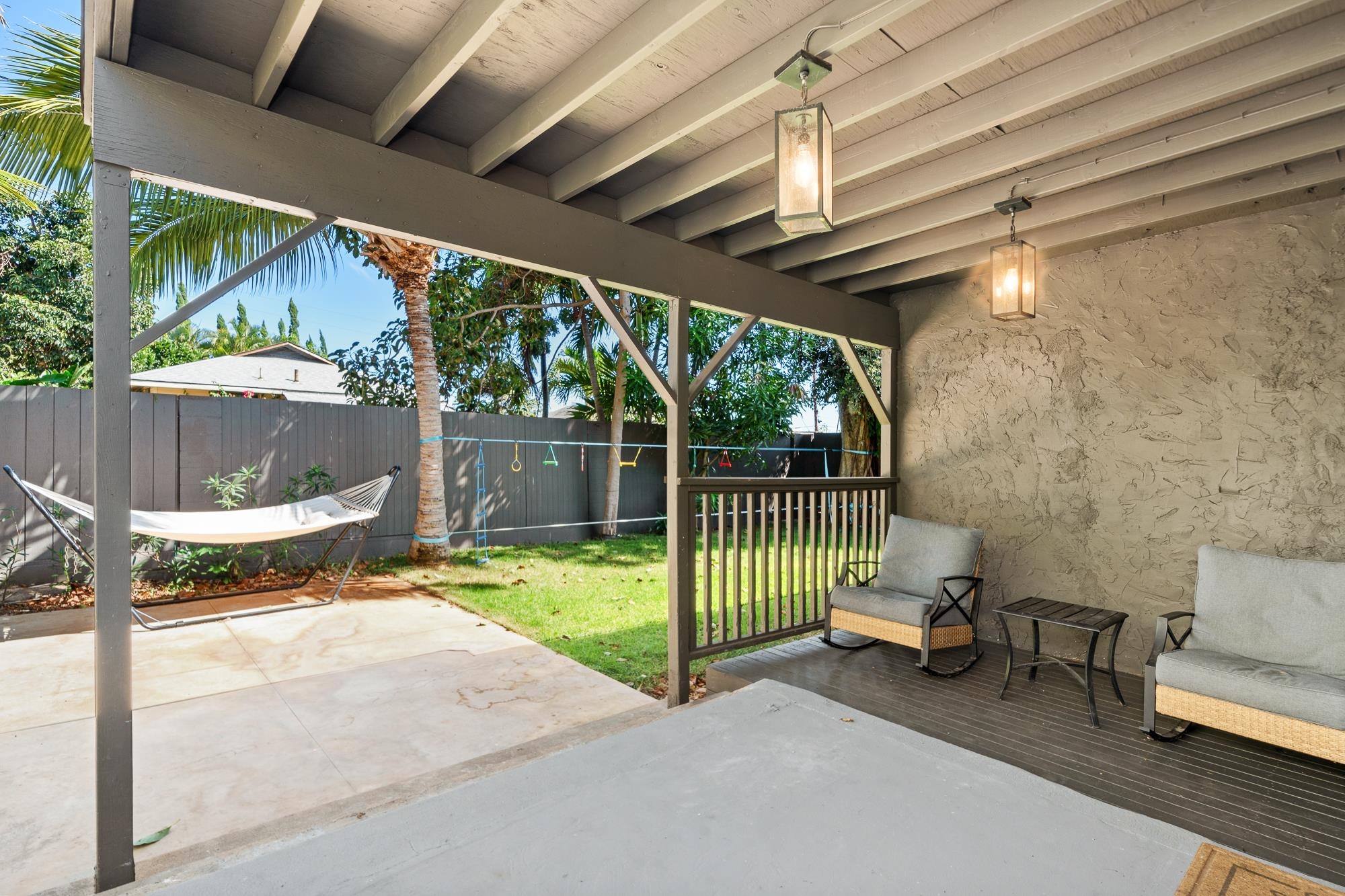 2074 Puuohala Road Wailuku, HI 96793 - Photo 25 of 37 a view of a porch with furniture and a backyard