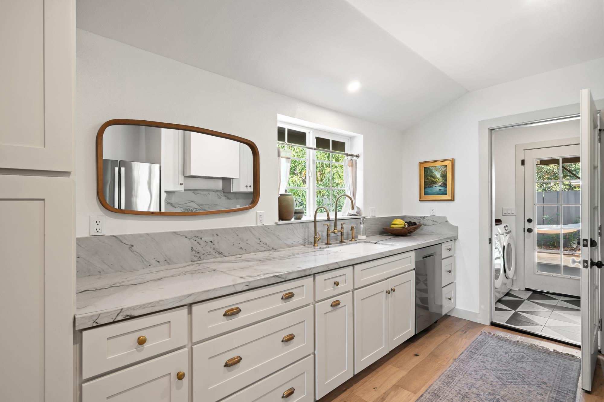 2074 Puuohala Road Wailuku, HI 96793 - Photo 7 of 37 a view of a double vanity sink and a mirror