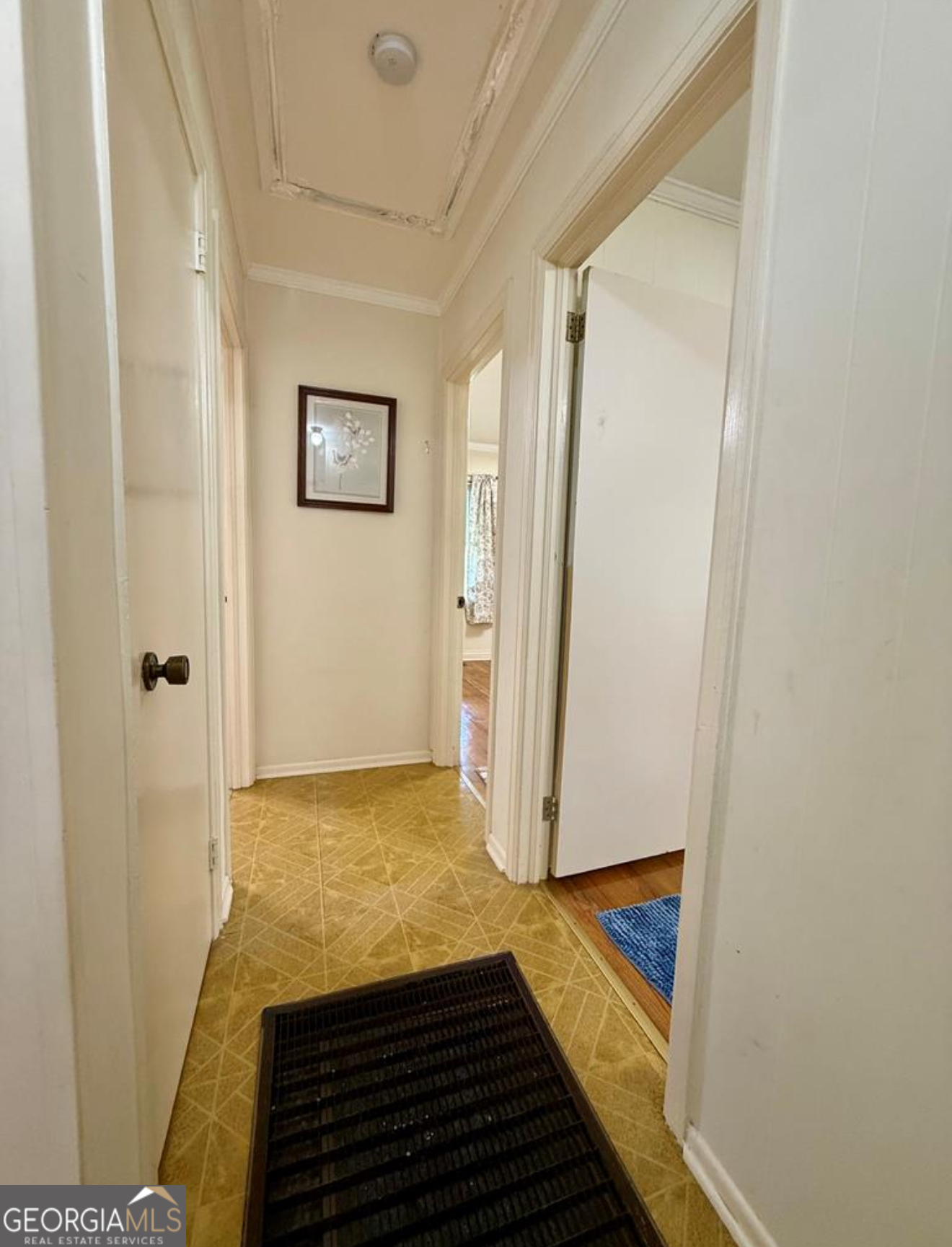 93 Arnall Boulevard Blakely, GA 39823 - Photo 22 of 43 a view of a room with wooden floor and staircase