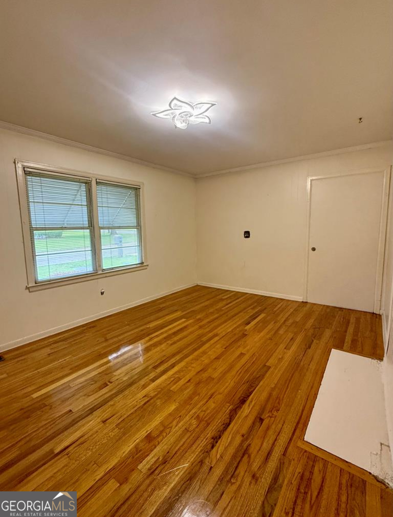 93 Arnall Boulevard Blakely, GA 39823 - Photo 23 of 43 a view of an empty room and window