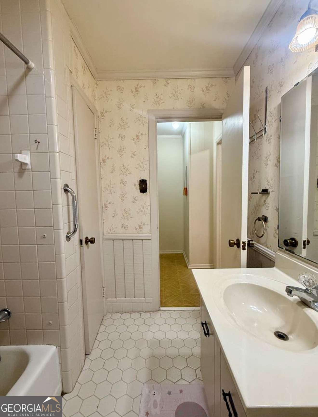 93 Arnall Boulevard Blakely, GA 39823 - Photo 27 of 43 a bathroom with a sink and a mirror