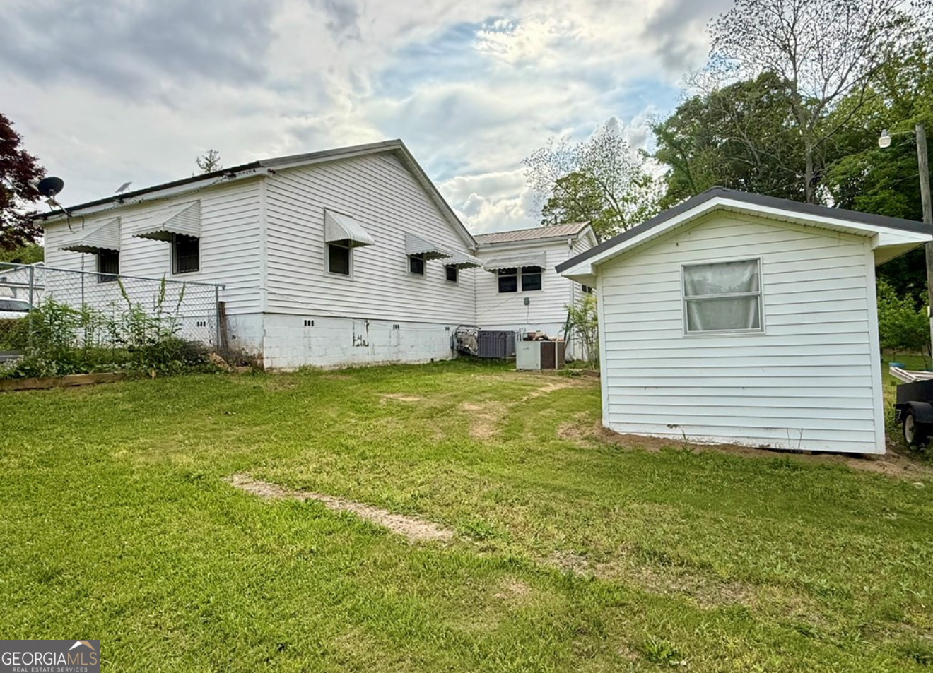 93 Arnall Boulevard Blakely, GA 39823 - Photo 39 of 43 a view of a house with a yard