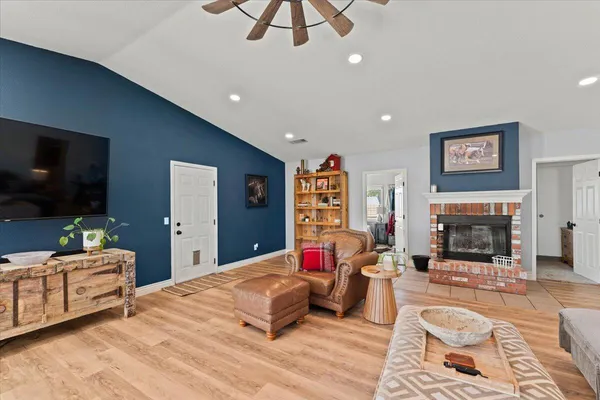 a view of a yard with a tree