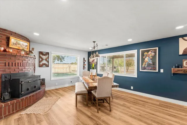 a view of a kitchen with furniture and a window