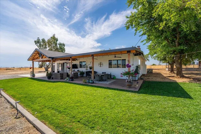 a living room with furniture or couch and a fireplace