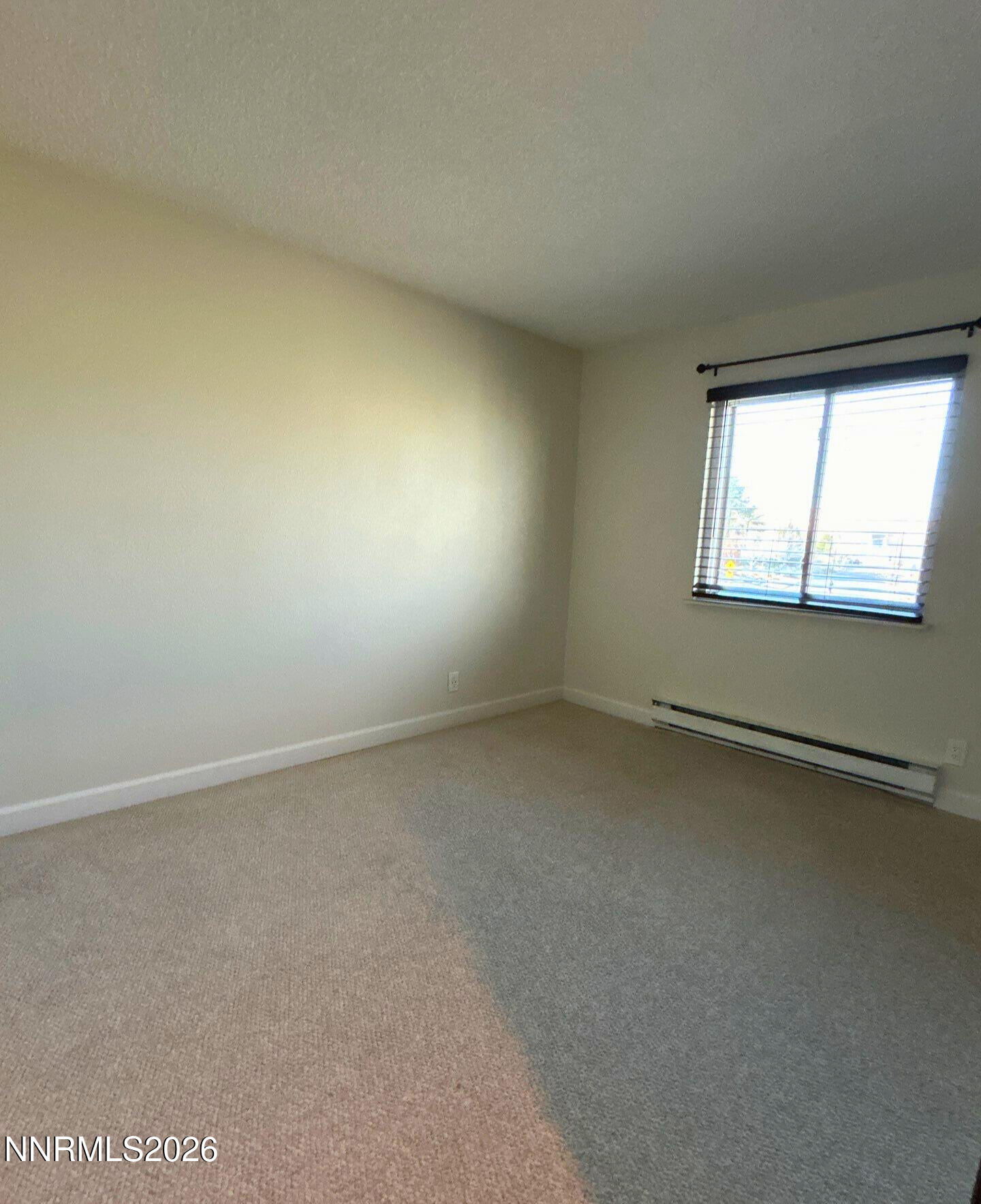 2450 Lymbery Street, Unit 305 Reno, NV 89509 - Photo 12 of 13 an empty room with a window