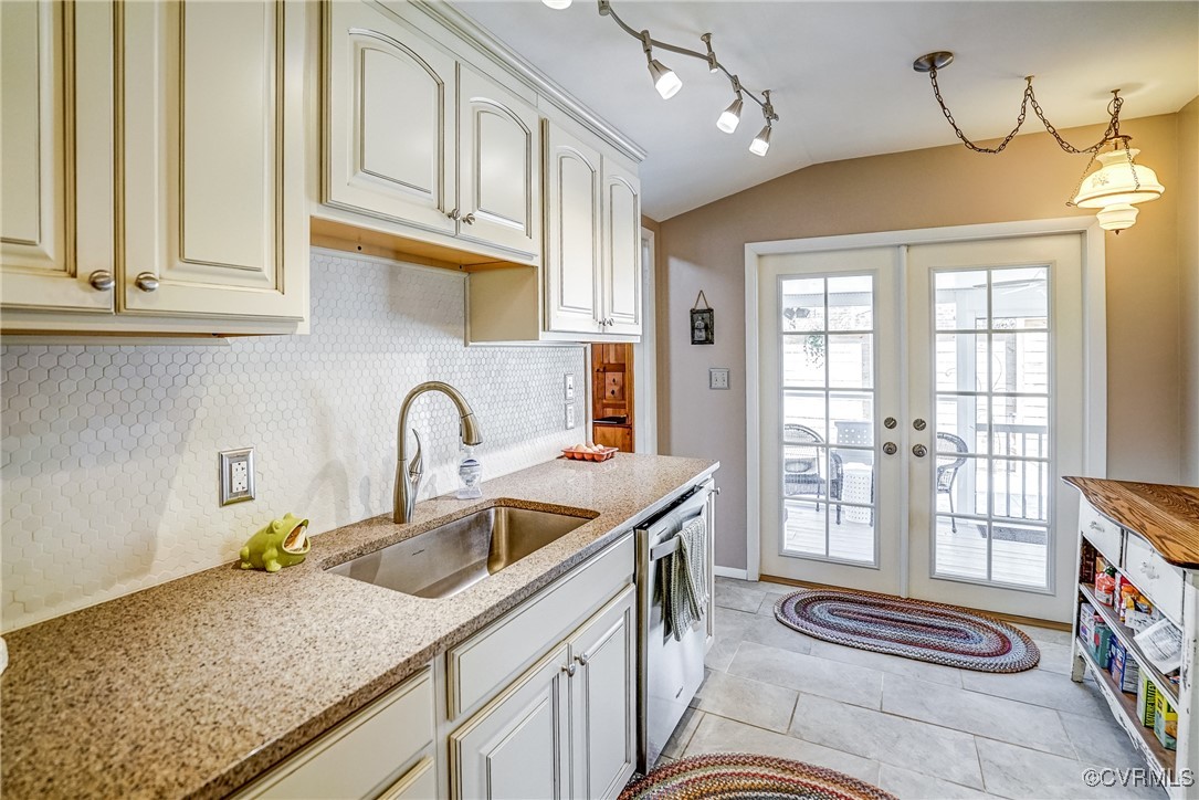 2124 Tarleton Drive Charlottesville, VA 22901 - Photo 16 of 45 a kitchen with stainless steel appliances granite countertop a sink a stove and a wooden cabinets