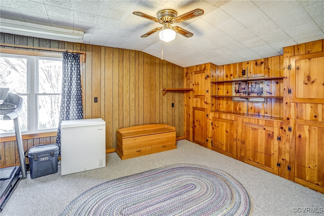 2124 Tarleton Drive Charlottesville, VA 22901 - Photo 20 of 45 a bedroom with a bed and a chandelier