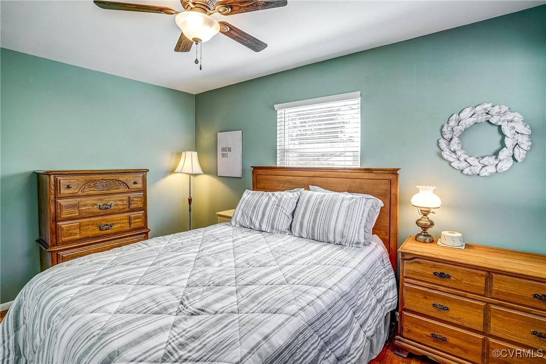 2124 Tarleton Drive Charlottesville, VA 22901 - Photo 27 of 45 a bedroom with a bed and a chandelier