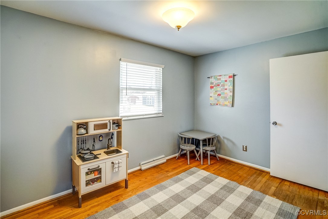 2124 Tarleton Drive Charlottesville, VA 22901 - Photo 32 of 45 a room with furniture a air conditioner vent and a window