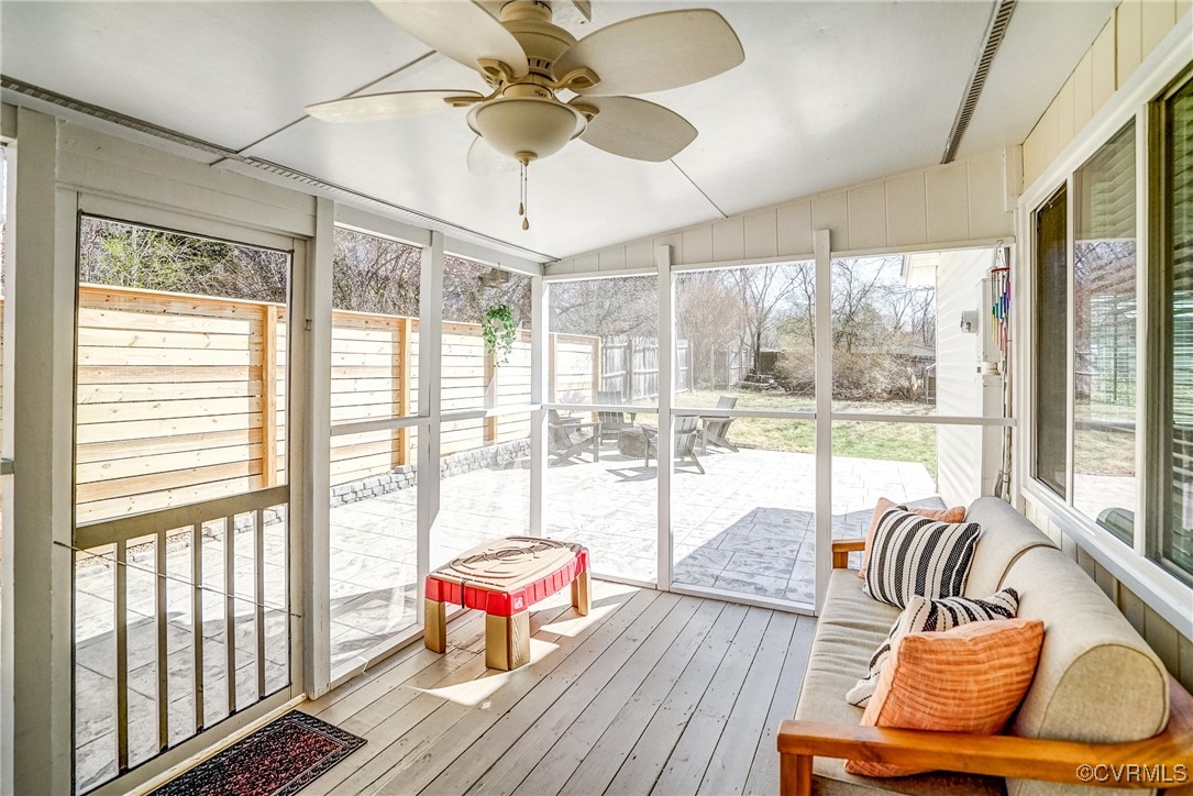 2124 Tarleton Drive Charlottesville, VA 22901 - Photo 34 of 45 a living room with furniture and a floor to ceiling window