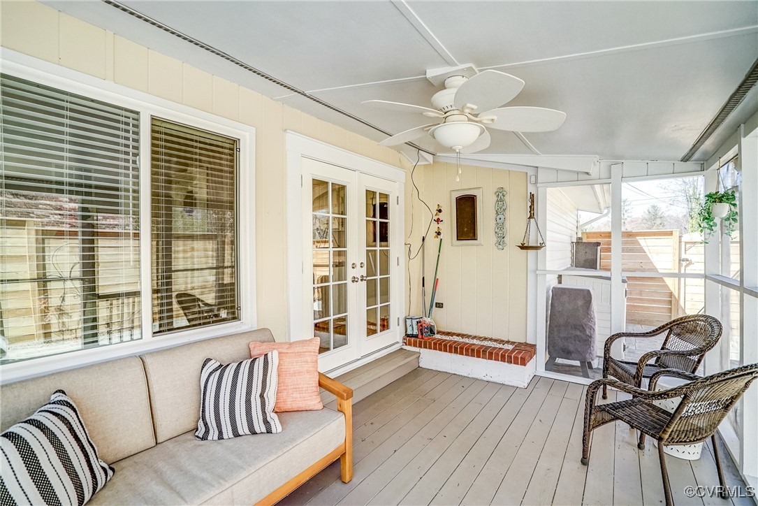 2124 Tarleton Drive Charlottesville, VA 22901 - Photo 35 of 45 a living room with furniture a dining table and a large window