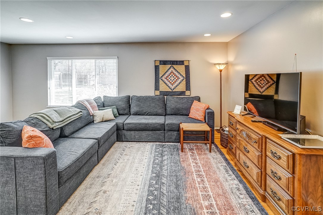 2124 Tarleton Drive Charlottesville, VA 22901 - Photo 6 of 45 a living room with furniture and a flat screen tv