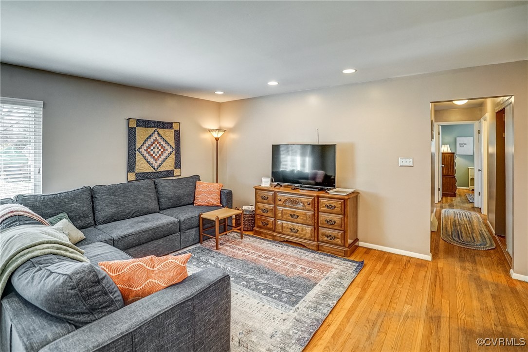2124 Tarleton Drive Charlottesville, VA 22901 - Photo 7 of 45 a living room with furniture and a flat screen tv