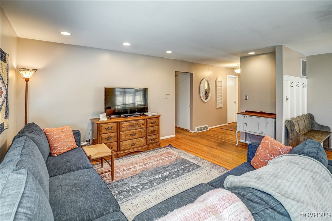 2124 Tarleton Drive Charlottesville, VA 22901 - Photo 8 of 45 a living room with furniture and a flat screen tv