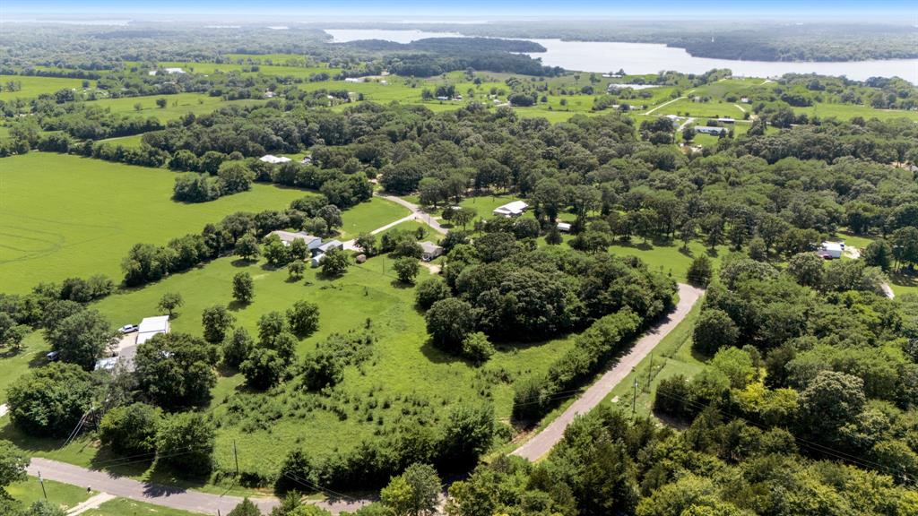 0 County Road 1727 Yantis, TX 75497 - Photo 4 of 7 a view of a garden with a building
