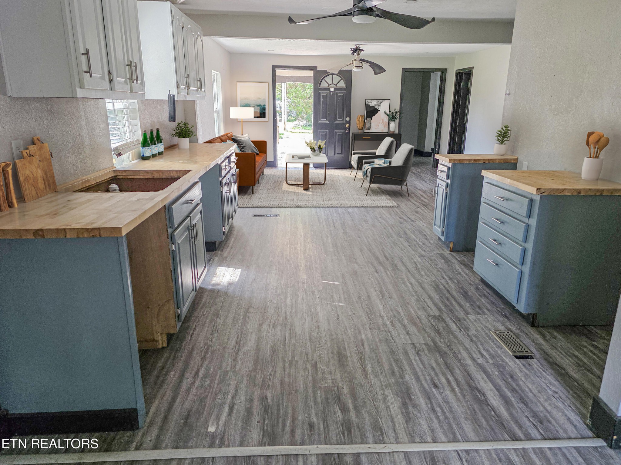 218 Burns Street Alcoa, TN 37701 - Photo 25 of 27 a living room with stainless steel appliances granite countertop furniture wooden floor and a view of kitchen
