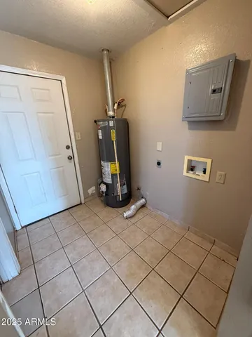 a bathroom with a sink mirror and toilet