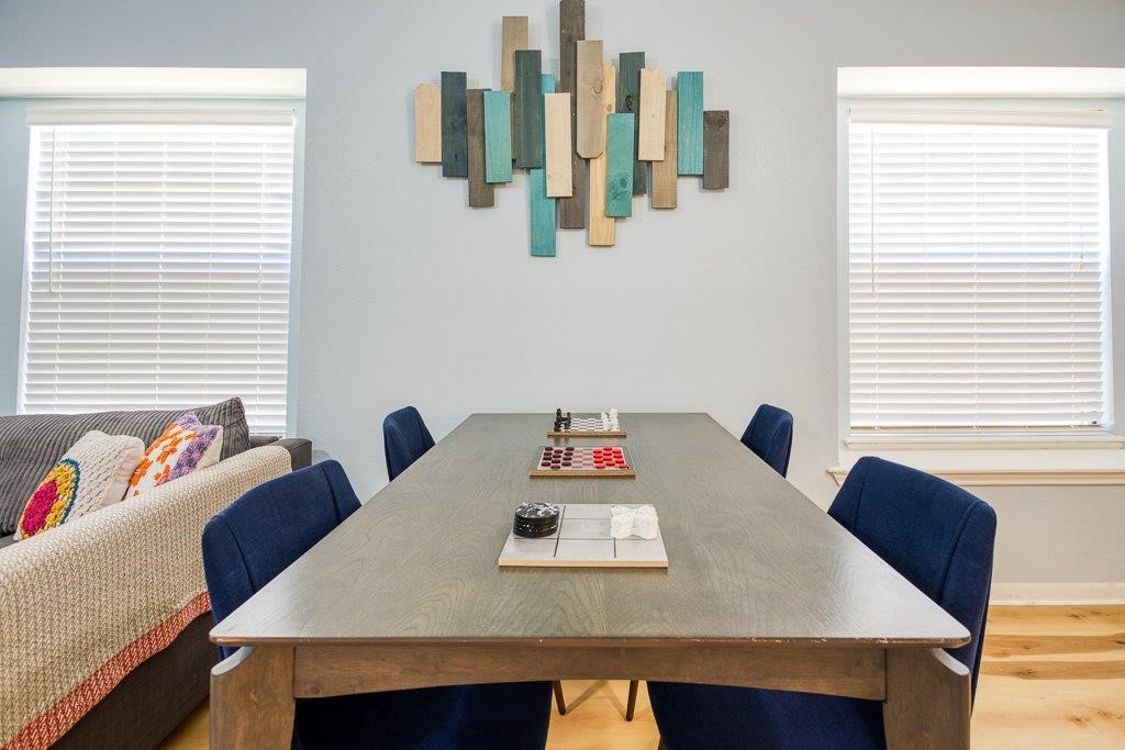 906 St Christopher Street Corpus Christi, TX 78418 - Photo 11 of 40 a view of a dining room with furniture and window