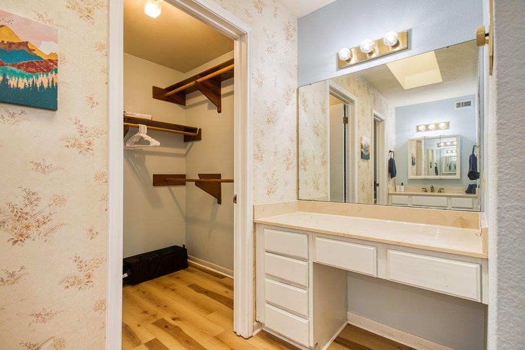 906 St Christopher Street Corpus Christi, TX 78418 - Photo 27 of 40 a bathroom with a shower and a sink