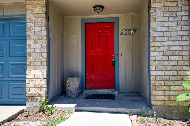 a view of a livingroom with wooden floor and a window