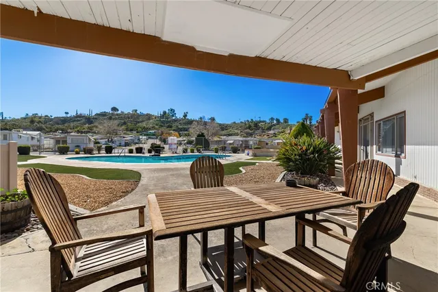 a view of a swimming pool with a lake