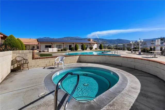 a kitchen with a table and chairs