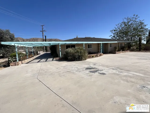a view of a house with a patio