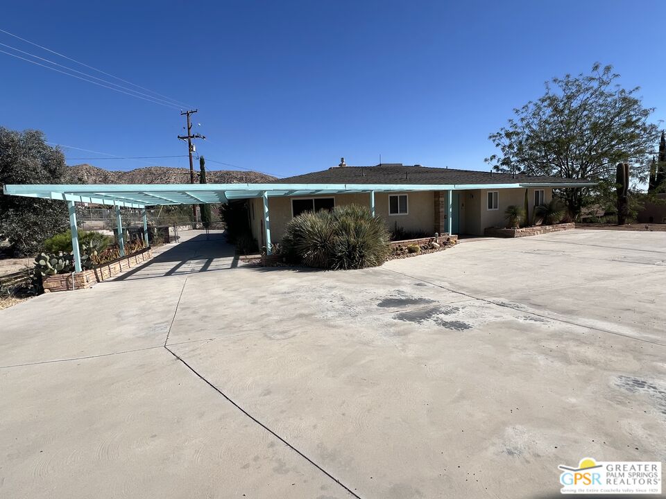 Undisclosed Address Yucca Valley, CA 92284 - Photo 1 of 46 a view of a house with a patio