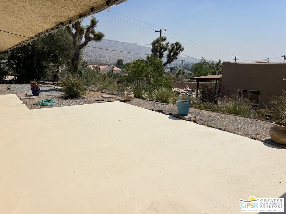 Undisclosed Address Yucca Valley, CA 92284 - Photo 14 of 46 a view of a house with a yard