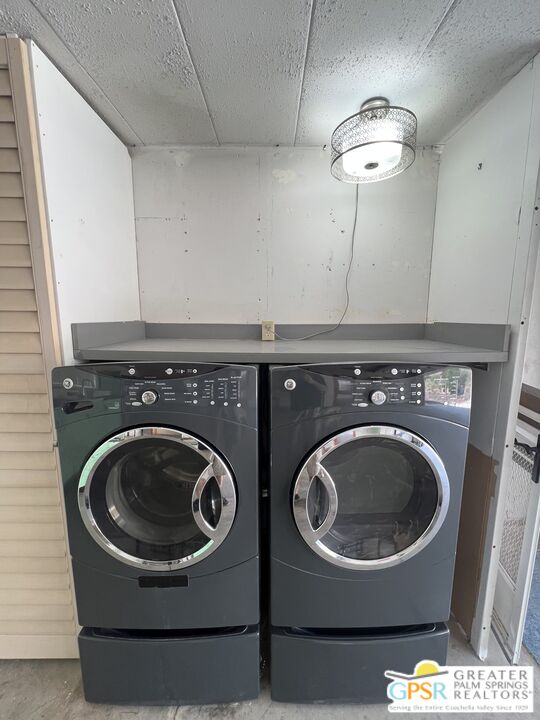Undisclosed Address Yucca Valley, CA 92284 - Photo 18 of 46 a utility room with dryer and washer