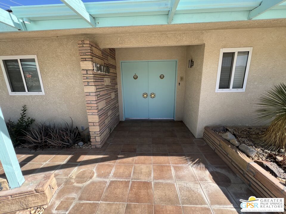 Undisclosed Address Yucca Valley, CA 92284 - Photo 2 of 46 a view of a backyard of the house