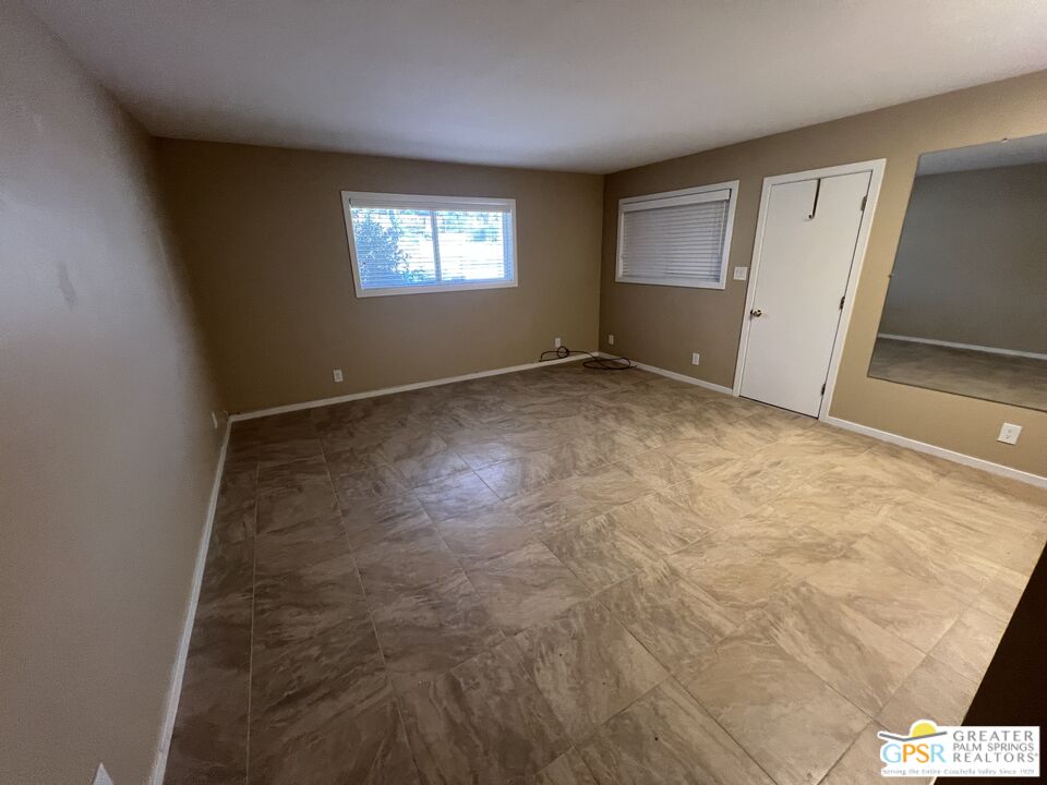 Undisclosed Address Yucca Valley, CA 92284 - Photo 27 of 46 an empty room with windows
