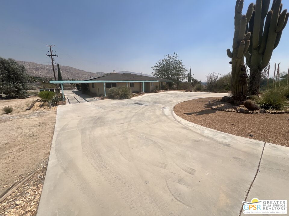 Undisclosed Address Yucca Valley, CA 92284 - Photo 32 of 46 a view of a backyard