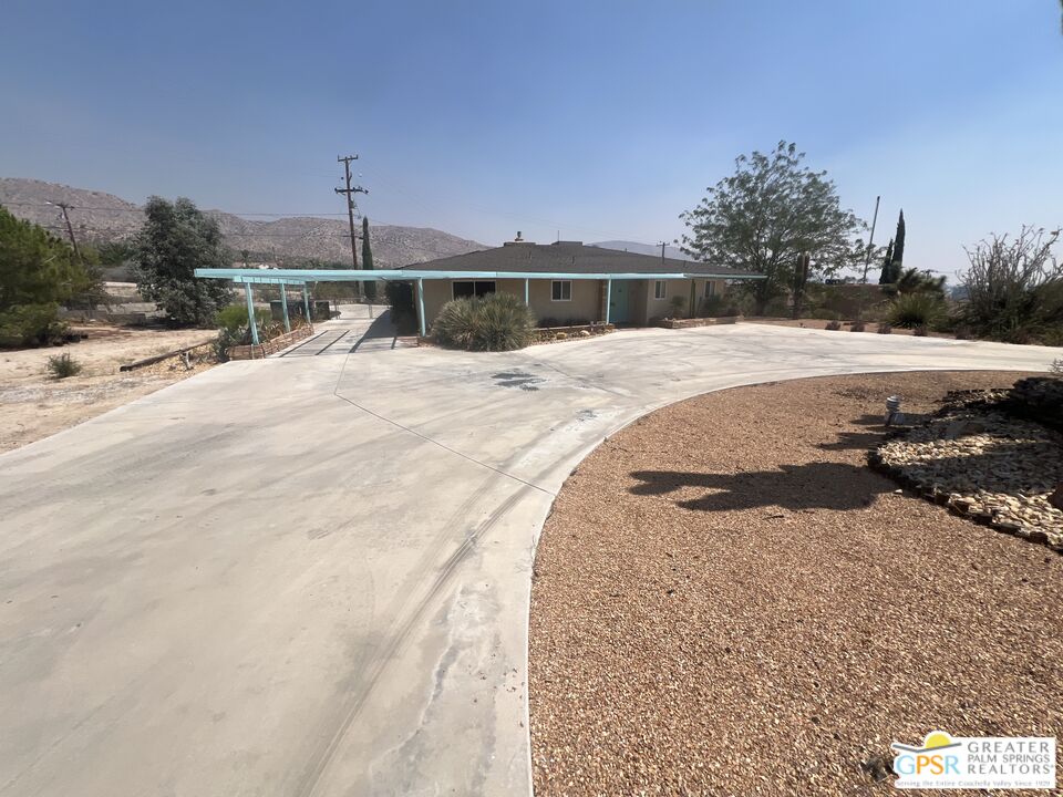 Undisclosed Address Yucca Valley, CA 92284 - Photo 34 of 46 a view of swimming pool with a yard