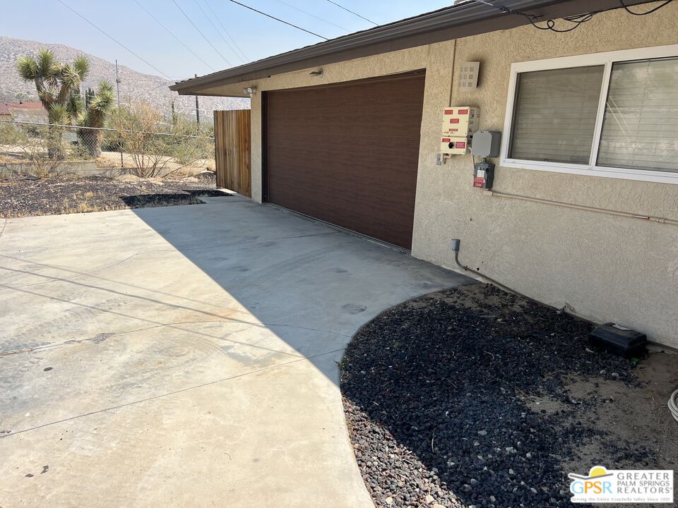 Undisclosed Address Yucca Valley, CA 92284 - Photo 35 of 46 a bedroom with a bed and a window