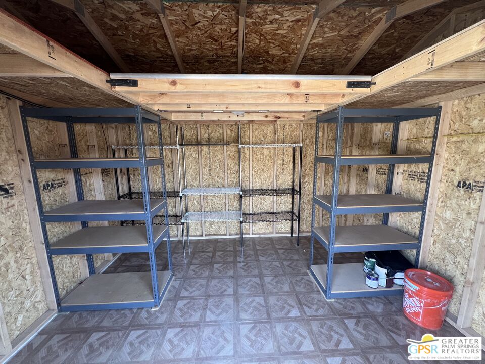 Undisclosed Address Yucca Valley, CA 92284 - Photo 39 of 46 a view of a room with racks on the wall