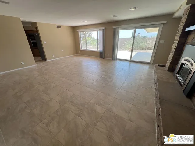 a fireplace with a clock on top of it