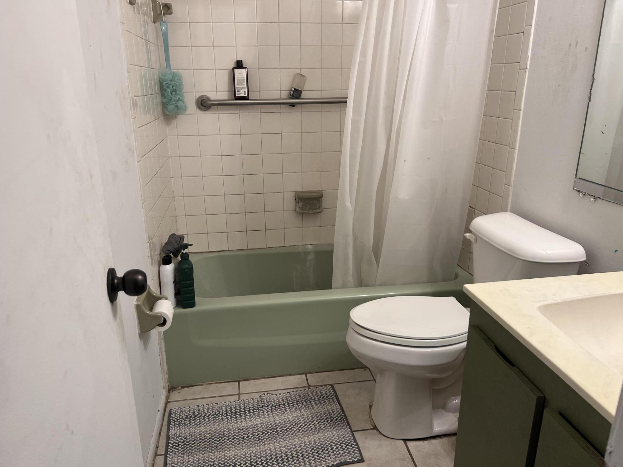 2621 Southeast Clayton Street Stuart, FL 34997 - Photo 32 of 40 a bathroom with a sink and a toilet