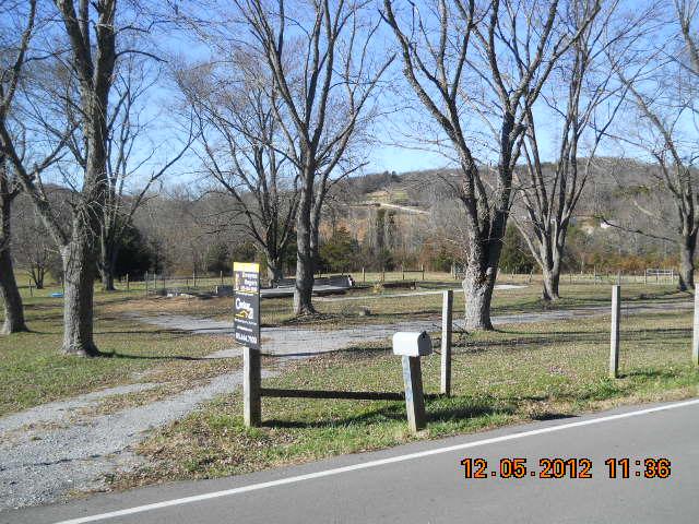 370 North Commerce Road Lebanon, TN 37090 - Photo 16 of 20 a view of street with a bench and trees