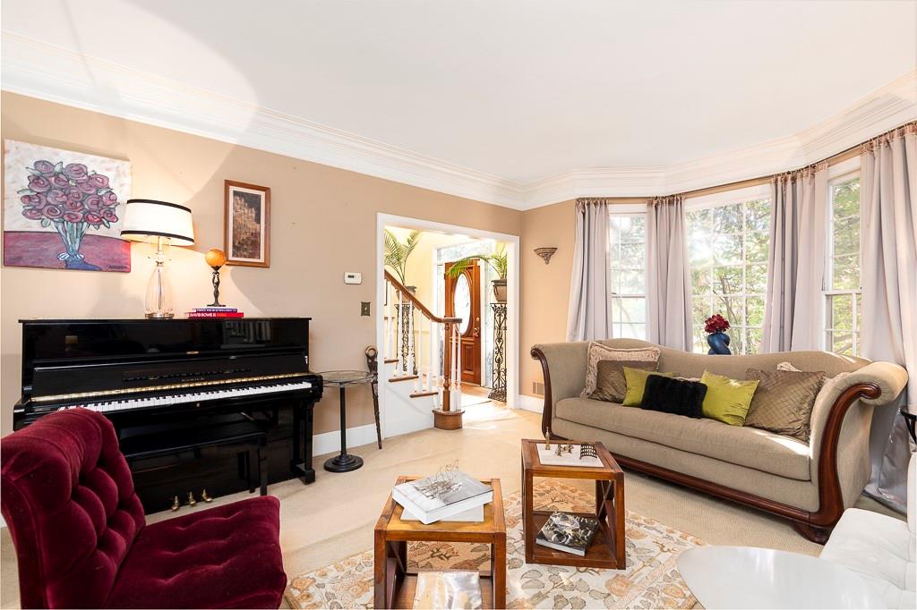 135 Lazy Laurel Chase Roswell, GA 30076 - Photo 14 of 64 a living room with furniture and a flat screen tv