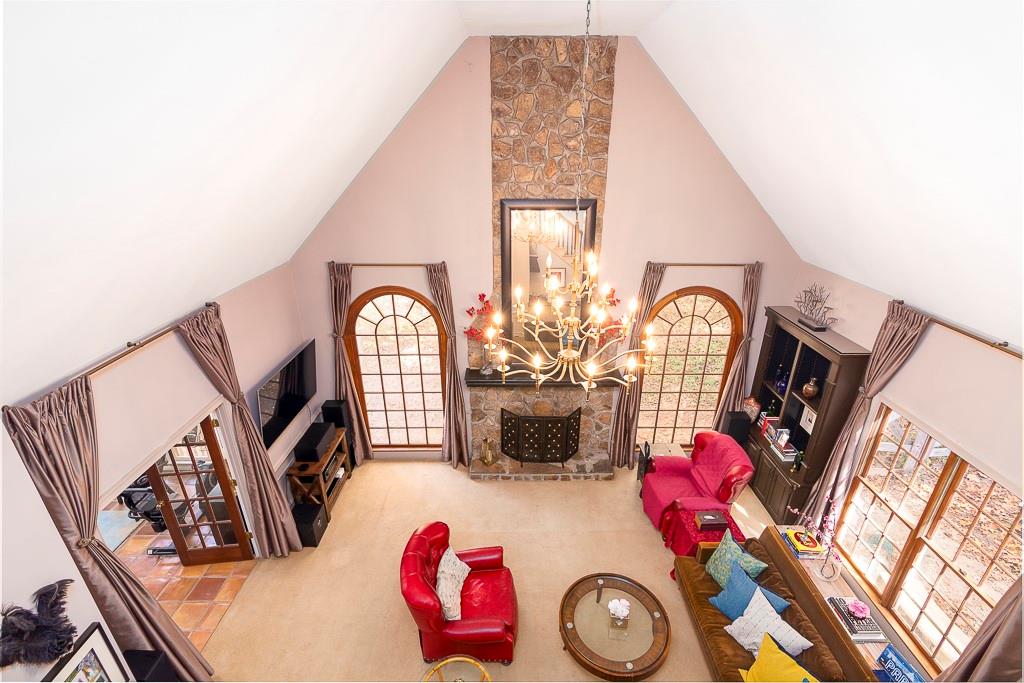 135 Lazy Laurel Chase Roswell, GA 30076 - Photo 2 of 64 a view of living room washer and dryer