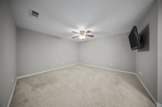 a view of a livingroom with a flat screen tv